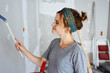 © contrastwerkstatt - Young woman redecorating the walls of her house