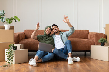 Poster - Happy man and woman using laptop after relocation