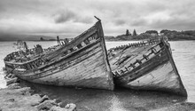 Old Wrecked Fishing Boats At Salen Beach, Isle Of Mull, Scotland, Uk