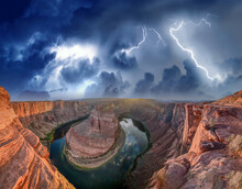 Horseshoe Bend Panoramic Aerial View, Arizona. Rocks And Colorado River During A Storm.