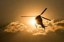 Helicopter With Sunset