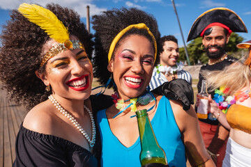 Carnaval Party in Brazil, happy people together enjoying street festival in costume.