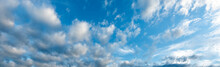Banner Tropical Summer Blue Sky Fluffy White Cloud Summertime On Light Sunny Day Cloudscape. Panoramic Clear Bright Blue Skyline Spring Sunlight Climate Background. Heaven Blue Ecology For Web Banner