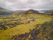 Aerial view of moss covered lava fields in Iceland during cloudy day