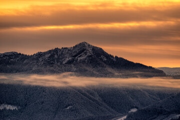 Wall Mural - Snowy winter mountain landscape and colorful sky due sunrise over hill Sina in Low Tatras mountains at Slovakia