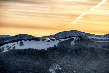 Wall Mural - Colorful orange sky over hill Malinne in Great Fatra mountains at Slovakia