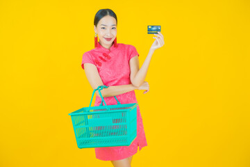 Wall Mural - Portrait beautiful young asian woman smile with grocery basket