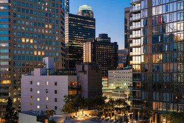 Wall Mural - Illuminated cityscape of Los Angeles downtown at summer night time, California, USA. Skyscrapers of panoramic city center of LA.