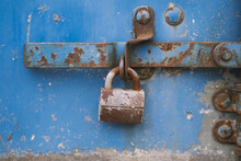 Photo Of An Old Lock On A Metal Door.