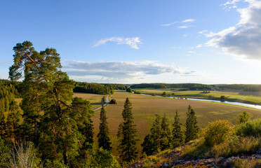 A beautiful Finnish countryside landscape on a bright summer day in Lieto, Finland.