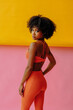 © Carlos David - beautiful athletic young black woman in sportswear posing in studio