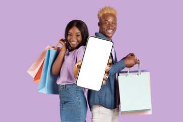 Black couple showing blank empty smartphone screen for mockup