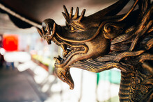 The Forged Figure Of A Winged Dragon Sculpture At Worship Of Temple Thailand.
