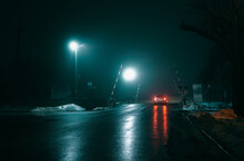 Car At A Railway Crossing At Night During Fog, Winter