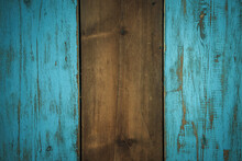 Photo Of The Texture Of A Beautiful Craft Fence Made Of Wood Painted With Blue Oil Paint.