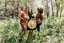 Group Of Women Smiling And Laughing In Wooded Area