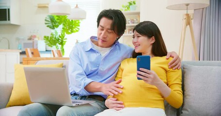 Poster - asian pregnant couple use computer