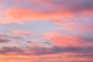 Wall Mural - Cloudscape with pink clouds and blue sky. Sunset time, Biarritz, France.