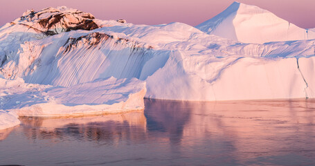 Wall Mural - climate change - iceberg and ice from glacier in arctic nature on greenland
