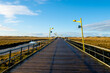 Pier over the dunes at the Wadden Sea in North Frisia - travel photography