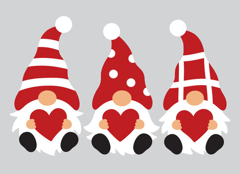 Fototapete - Three Valentine’s day gnomes with polka dot and stripes hats holding hearts vector illustration.