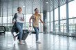 © zinkevych - Two excited tourists hurrying to catch the flight