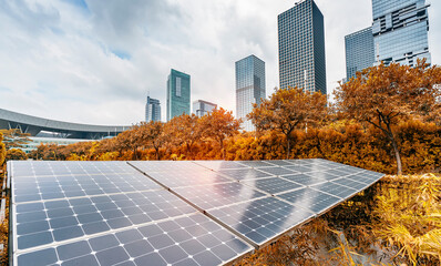 Wall Mural - ecological energy renewable solar panel plant with urban landscape landmarks