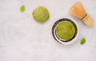 Fototapete - Matcha green tea ice cream with green tea powder and mint leaves  setup on white stone background . Summer and Sweet menu concept.