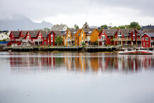 Typical Rourbuer Fishing Cabins In Lofoten Village On A Rainy Day