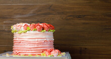 Fascinating Multi-layer Tasty Cake With Creative Cream Topping As Charming Blooming Roses Served On Table Of Anniversary Party On Romantic Valentine Event For Sweet Gift To Celebrate Wedding.