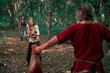 © ADDICTIVE STOCK - Vikings fighting in forest for historic reenactment