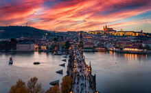 Beautiful Sunset View Of The Lit Charles Bridge And Vlatava River To The Old Lesser Town Of Mala Strada In Prague, Czech Republic