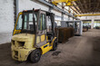 © vadim_orlov - Forklift truck in a production area. The picture was taken in Russia, in the factory shop