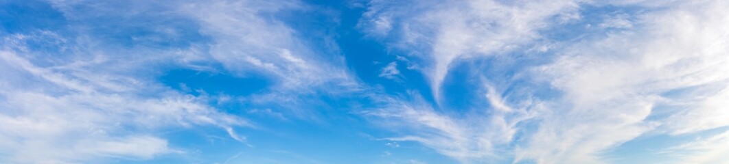 panorama or panoramic photo of blue sky and white clouds or cloudscape. breathing concepts for billb