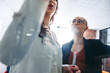 © Jacob Lund - Confident businesswomen brainstorming in an office