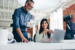 © Jacob Lund - Two colleagues working on a project in the office