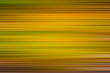 Blurred Concentrated Horizontal Yellow And Green Stripes With Brown Vignette. Background