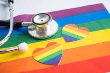 Black Stethoscope With Heart On Rainbow Flag Background, Symbol Of LGBT Pride Month  Celebrate Annual In June Social, Symbol Of Gay, Lesbian, Bisexual, Transgender, Human Rights And Peace.