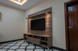 © stockyme - LED TV on the multimedia wall in living room interior design idea