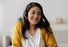 Operator Of Hot Line. Portrait Of Friendly Arab Customer Service Representative Wearing Headset In Call Center