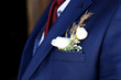 © Vahagn - the groom in a blue  wedding suit, a tuxedo in a white shirt and a buttonhole