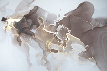 Abstract Brown Background With Gold. Beautiful Smudges Made With Alcohol Ink