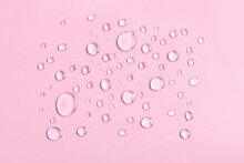 Water Drops On Pink Background