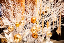 Glittering Colorful Christmas Decorations In Golden, Yellow And White Colors