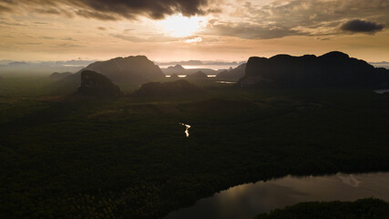 Wall Mural - 4k aerial drone footage flying over mangroves and lush rainforest in phangnga bay thailand the view 