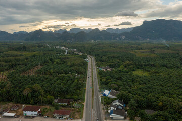 Wall Mural - 4k aerial drone footage flying over mangroves and lush rainforest in phangnga bay thailand the view 