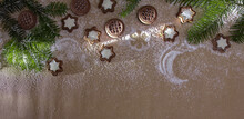 Sugar Cookies With Cream. Imitation Of Snow And Light. Images Of Stars And Moons. Fir Branches. Free Space. Flat Lay