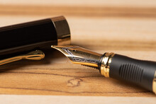 Fountain Pen, Beautiful Fountain Pen Positioned On A Rustic Wooden Surface, Selective Focus.
