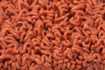 Wall Mural - raw beef ground meat, closeup, on a table