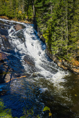 Wall Mural - View on the Calvaire waterfall, a serie of small cascades located in Lanaudiere region of Quebec, Canada